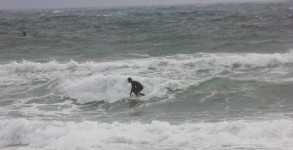 Surfer at the Pensacola Beach Gulf Pier on a December 2012 afternoon