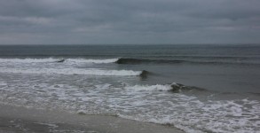 Tiny lines coming in on a cold, gray December morning on Pensacola Beach